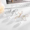 Sinzry Moda Kostium Biżuteria Koreański Stylowy Cubic Cyrkon Bowknot Pearl Vintage Dangle Kolczyki dla kobiet