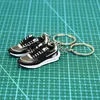 7 stilar mini 3d stereo sneaker keychain kvinna män barn nyckel ring gåvor skor nyckelringar bil handväska nyckelkedja basket skor nyckelhållare