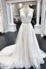 2022 A-Linha Vestido de Noiva de Champanhe Profundo Pescoço V-Pescoço Cap Floral Lace Sleeve Summer Vestidos Bridal Plus Size para Mulheres Boêmio