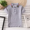 Härliga Baby Boys Girls Cotton T-shirts Summer Kids Kort ärm T-shirt Barn Casual Turn-Down Collar Shirts Child Tops Tees Barnkläder 2-12 år