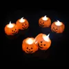 12 stks / partij batterij aangedreven pompoen led flikkert vlamloze kaars licht halloween decoratie ornament festival party home decor