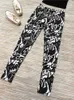 Alta Qualidade Moda Mulheres Scrawl Letters Imprime leggings pretos básicos Q0801