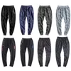 Nowe spodnie męskie elastyczne talii plus size mężczyźni spodnie dresowe luźne dorywczo duży rozmiar kamuflażu joggers harem męska odzież p0811