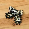 2-bitars baby leopard print pompon dekor ärmlös rompers med huvudband set 210528