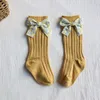 Calzini caldi delle ragazze di Bowknot Fiocchi di fiori Baby Princess Bowknot Calzino al ginocchio Calzini lunghi morbidi per ragazze Stripped Children Footsocks Abbigliamento per bambini T500480