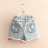 夏のファッションの美容かわいい2 3 4 6 8 10 12年の子供のショートジーンズパンツ赤ちゃんキッズガールズデニムタッセルホールショーツ210701