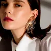 gold fan earrings