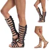 Sandales été rétro gladiateur Bandage femme genou haut plat Sandalia Feminina femmes Roma chaussures dames creux croix sangle