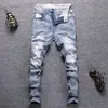 Jeans da uomo Ly Street Fashion Men Pantaloni in denim hip-hop di design ricami distrutti strappati sottili elastici blu chiaro