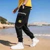 رجل jogger التمويه الجيوب الجانبية فضفاضة نمط الرجال sweatpants الأزياء 2021 شارع العليا عارضة السراويل S-XXXL 3XL Y0927