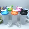 600 ml Drinkware Portable Sport Shaker Bottle Juice Milkshake Protein Powder Läcksäker Mixing Shake Cup med Shak Balls BPA Gratis kondition