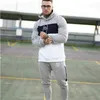 Mäns Fitness Designer TrackSuits Fashion Fritid kostym Splicing Tröja Hoodie Byxor Löpande kostymer Hoodies och byxor Ställ in gym Sportkläder