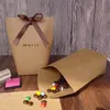 2021 50pcs haut de gamme noir blanc bronzant Merci sac de bonbons français merci faveurs de mariage boîte-cadeau paquet fête d'anniversaire faveur sacs