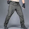 貨物パンツメンズマルチポケット屋外戦術的な汗パート軍の軍隊プラスサイズの防水クイックドライエラスティックハイキングズボン211201