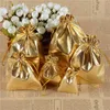 100 pcs / saco 7x9cm 9x12cm 13x18cm Jóias ajustáveis ​​Embalagem de prata / cor de ouro cordão de cordão de veludo bagwedding sacos de presente malotes