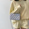 Kors kropp handväskor för kvinnor vild rhombus axelväska Koreansk mode västerländsk stil liten rund högkvalitativ budbärare