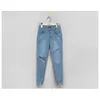 SHIJIA Herbst Frauen Denim Jeans Quaste Dünne Blaue Zerrissene Löcher Chic Böden Hohe Taille Stretch Unregelmäßige Jeans Weibliche 210302