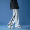 Luźne spodnie Moda męska Dorywczo Oversize Zipper Spodnie Kobieta Stripe KPOP Mężczyzna Streetwear Odzież
