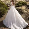 2021 New Dubai Elegante maniche lunghe A-line Abiti da sposa Sheer Girocollo Appliques in pizzo Perline Vestios De Novia Abiti da sposa con bottoni