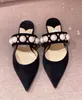 black leather pointed toe flats