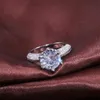2021 Nueva llegada Joyería de moda clásica de seis garras Plata de ley 925 Corte redondo Topacio blanco Pave CZ Diamante Eternidad Anillo de bodas para mujeres