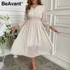 Beavant Women Floral Print Dress Eleganckie Kobiety Flare Rękaw A Linia V Neck Sash Dress High Waist Work Wear Office Lady Dress 210709