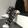 Houzhou harajuku överdimensionerad rutig pant koreansk mode svart vit kontrollerade byxor för kvinnliga fall vida ben tröjor 220226
