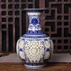 Jingdezhen Полые керамические китайский синий и белый пирсинг гостиной украшения фарфоровой цветок ваза 210310