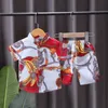 Set di abbigliamento con stampa di moda Set di costumi da bagno estivi per bambini di piccole e medie dimensioni a maniche corte per ragazzi