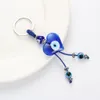 Evil Eye fashion Portachiavi in vetro blu a forma di cuore pendente accessori per gioielli portachiavi semplici di alta qualità all'ingrosso EY5044 J0306