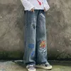 Vintage tecknad graffiti grafiska jeans män lösa denim byxor streetwear rakt hip-hop byxor kvinnor hajuku stil fritid g0104