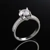結婚指輪の高級高級トップクオリティシルバーカラーメッキラウンドジルコンブライダルモダンデザインエレガントな婚約リングの女性ジュエリー