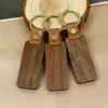 Gros plusieurs styles porte-clés en bois blanc porte-clés en métal sangles sculpture personnalisée en cuir PU porte-clés en bois