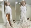 Sexig Illusion Toppkvällsklänningar med Sequins Crystal African Hi Lo Feather Kjol Arabiska Aso Ebi Prom-kappor med långa ärmar