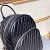 Designer- mode ryggsäck axelväska lädermönster svart 26cm högkvalitativa resor handväska shopping plånböcker