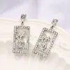 Brincos de charme para designer de moda feminina banhado a ouro 18K Brinco de agulha de prata 925 de luxo com incrustações de diamante e pérola de alta qualidade, joias de casamento para mulheres