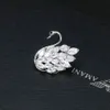 Mode klassieke sprankelende zwaan broche met AAA kubieke zirconia hoge kwaliteit metalen revers pins pak accessoires vrouwen