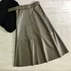 REALEFT Autumn Winter PU-leather mi-long Skirt with Belt High Waist Vintage A-line Skirt Chic Mid-calf Umbrella Skirts 210721