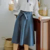 Kjolar 2022 höst våren kvinnor A-line kjol japansk hög midja båge tjejer casual solid knä längd bomull flare