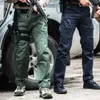 6xL городские военные тактические брюки упругих Swat боевые армейские брюки многие карманы водонепроницаемые износостойкие случайные грузы мужские 210715