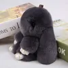 Fluffy Bunny Keychain Kvinnor Söt Kanin Fur Boll Key Holder Pompon Toy Doll Väska Charm Bil Pompom de Forure KeyRings Smycken G1019