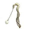 Bookmark Single Luminous Glow In The Dark Silver Dragon Shape Bookmarks Fashion Classics Petals Beads Free Creative R20