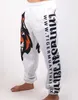 Men boxing sports fitness Tigter Muay Thai Personality Loose Large Size Thai Fist and Jogging Pants Running Fights Kickboxing G1007