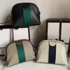 Borsa a tracolla a righe da donna di alta qualità Borsa a forma di conchiglia in buona pelle Borse a tracolla di design di lusso Nero Bianco Classico 329E