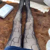 Svart bokstäver damer tights strumpor underkläder mesh sock hoSiery sexig transparenta kvinnor långa strumpor kvinnokläder160j