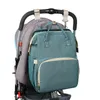 Mommy Diaper Bag Nyfödd baby säng ryggsäck Crib Bassinet Travel bekvämlighet Skicka krokar med Pad H11102348606