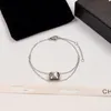 Mode nouvelle lettre perle chaîne pendentif bracelet 18K or rose titane acier bracelet diamant treillis bracelet