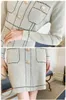 Dames décontracté tricoté robe femme 2021 nouveau automne mode o-cou or bouton déco à manches longues rayé pull robe Vestidos Y1006