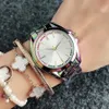 Orologio da polso al quarzo di marca per donna Ragazza cinturino in acciaio metallo cristallo colorato Orologi M100