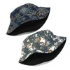 Cloches Uomo Donna Cappello estivo reversibile a secchiello Cappello tropicale con foglie di palma Stampa Hip Hop Protezione solare a tesa larga Cappello rotondo piatto da pescatore